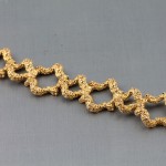 An 18ct gold bracelet, signed Greene (1,200 - 1,600)