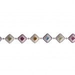 A multi-coloured gem set bracelet is estimated at 500-800.