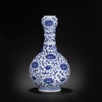 This blue and white "joined lotus" bottle vase made £679,650 at Bonhams.  (Click on image to enlarge).