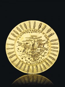 Pablo Picasso (1881-1973) - VISAGE TOURMENTÉ 22 carat gold repoussé plate Diameter: 16 3/8 in.  Courtesy Christie's Images Lt.d, 2013.  (Click to enlarge).