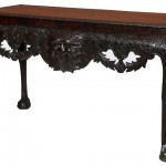 AN IRISH CARVED MAHOGANY SIDE TABLE, probably by Butler of Dublin, late 19th century, early 20th century (4,000-6,000).