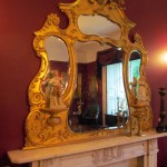 A Victorian rococo style overmantle (800-1,200).