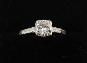 A solitaire diamond ring (7,000-8,000).