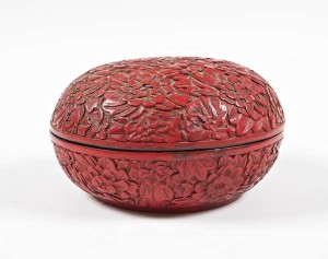 A 19th century Chinese carved cinnabar box and cover (500-800)