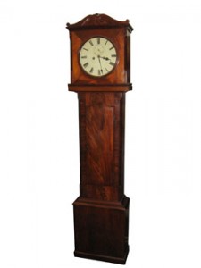 An early 19th century Cork longcase clock (1,500-2,500).