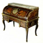 A French ormolu bureau a cylindre in the manner of Jean Henri Riesener madea hammer price of 7,600