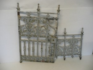 A Victorian cast iron gate and  more than 13 feet of matching cast iron railing (200-300)