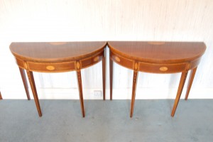 A pair of inlaid mahogany demi-lune card tables (2,000-3,000).