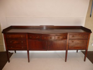 A Cork Georgian sideboard is estimated at 300-500.