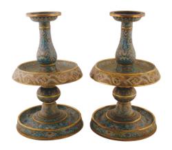 A pair of Qing cloisonne  enamelled  tiered candlesticks (10,000-15,000).