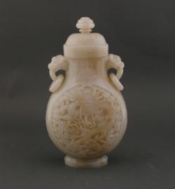 ing period white jade dragon vase and cover, profusely carved (30,000-50,000).