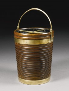 An Irish George III brass mounted peat bucket (£3,000-5,000).