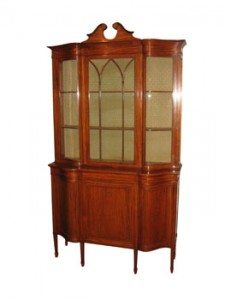 A satinwood display cabinet by Maple and Co.  (3,000-5,000)
