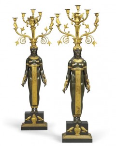 A pair of Empire ormolu patinated bronze and black fossil marble candleabra, attributed to Pierre-Phillippe Thomire c1802 (£70,000-100,000).
