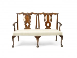 A George III mahogany double chairback settee (£5,000-7,000).
