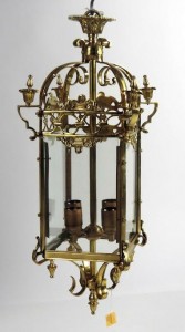 One of a pair of heavy decorated brass hall lanterns (250-350).