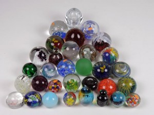 A collection of 30 glass paperweights, late 19th and early 20th centuries (280-380).