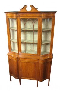 An early 20th Maples satinwood display cabinet (3,500-4,500).