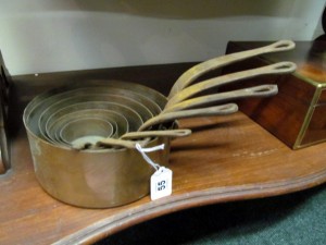 Set of Seven Graduated Copper Pans (150-250)