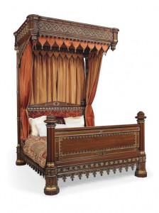 A GEORGE IV PARCEL GILT OAK HALF-TESTER BED CIRCA 1830, IN THE MANNER OF WILLIAM PORDEN (£4,000-6,000).
