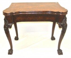 A George II walnut card table (2,000-3,000)