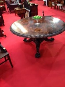 An early 19th century Irish American circular centre table at Niall Mullen Antiques.