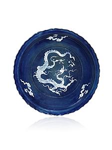 This rare foliate rim Yuan Dynasty (1279-1368) dish was sold to a Chinese collector. 