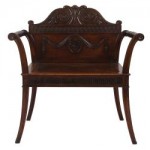 AN IRISH GEORGE III  ARMORIAL HALL SEAT, CIRCA 1800