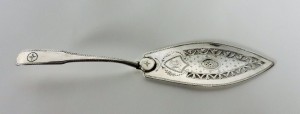 A Cork silver fish slice by Samuel Reily c1780 (1,800-2,500).