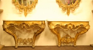 Pair of 19th century gilt wood console tables, one with marble top.
