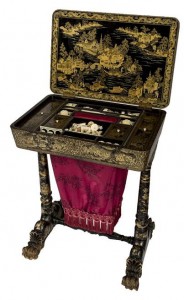A 19th century lacquered work table (1,200-1,800).