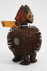 A NKisi Janus Headed nail fetish from the Congo (250-500).