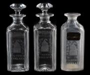 A set of three Bushmills cut and engraved spirit decanters (£300-500).