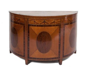 A FINE SATINWOOD, HAREWOOD AND ROSEWOOD CROSS BANDED SEMI ELLIPTICAL COMMODE, in George III style (2,000-4,000)