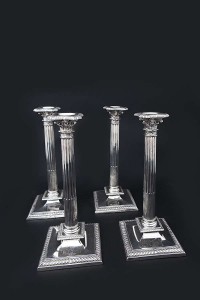 A FINE SET OF FOUR IRISH EARLY GEORGE III SILVER CANDLESTICKS, Dublin 1760, mark of Robert Calderwood (10,000-15,000).