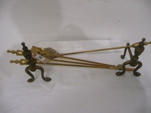 Antique brass fireirons and dogs (80-120).