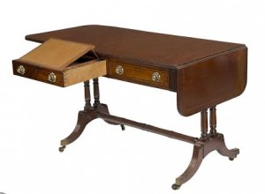 An Irish regency secretary sofa table (1,200-1,800).