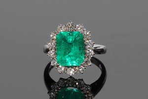 An emerald and diamond cluster ring (5,500-6,500).