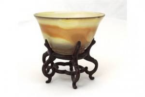 This small bowl on stand sold for 3,000 at hammer over an estimate of 200-300.