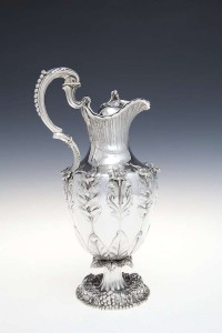 An Irish silver claret jug, Dublin 1852, mark of Robert W. Smith (2,500-3,500).