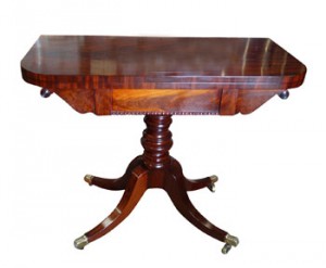 A Regency card table (1,200-1,800).