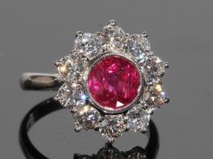 A ruby and diamond cluster ring (4,000-5,000)