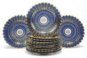 A SET OF TWELVE FRENCH CUT AND OVERLAY GLASS ‘SULPHIDE’ ARMORIAL DISHES LATE 19TH CENTURY (£1,000-1,500).  Courtesy Christie's Images Ltd., 2015.