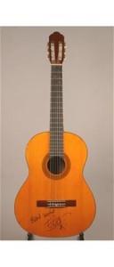 LOT 172 - THE EDGE'S STUDENT GUITAR.