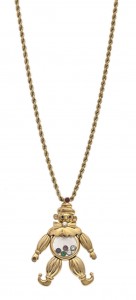An 18 carat gold and gem-set Clown pendant by Chopard (1,000-1,500).