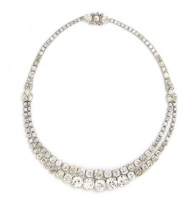 The circa 1930’s diamond necklace by Cartier, 47.00 carat total sold for 210,000.