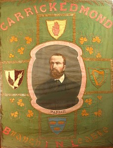 The Irish National League banner with a portrait of Parnell.