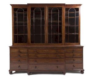 GEORGE IV MAHOGANY BREAKFRONT BOOKCASE by James Winter & Sons (10,000-15,000).