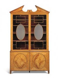 ATTRIBUTED TO THOMAS CHIPPENDALE, CIRCA 1773-75 A GEORGE III SATINWOOD BOOKCASE (£80,000-120,000).