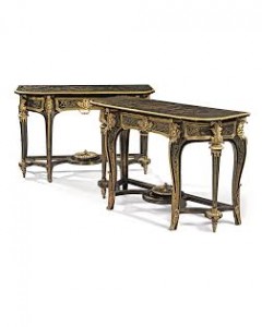 ATTRIBUTED TO ANDRE-CHARLES BOULLE, CIRCA 1710-1720 A MATCHED PAIR OF LOUIS XIV ORMOLU-MOUNTED AND BRASS-INLAID BROWN TORTOISESHELL BOULLE MARQUETRY AND EBONY PIER TABLES ( £1,200,000 - 1,800,000). 